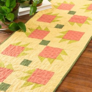 pq11575-tossed-bears-claw-table-runner-lifestyle-web