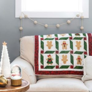 pq11761-go-gingerbread-throw-quilt_lifestyle_web