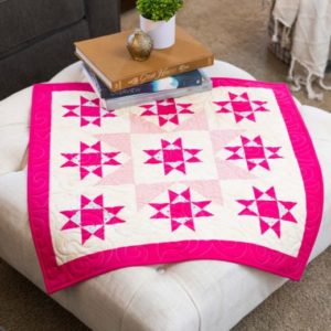 pq11861-qube-6in-stars-in-the-crown-throw-quilt_lifestyle_web