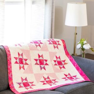 pq11862-qube-8in-stars-in-the-crown-throw-quilt_lifestyle_web