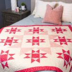 pq11864-qube-10in-stars-in-the-crown-throw-quilt_lifestyle_web