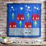 pq11928-stars-and-school-houses-wall-hanging_lifestyle_web