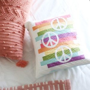 pq12034-rainbow-peace-sign-pillow-lifestyle-web