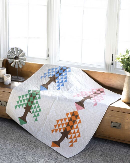 pq12135-a-tree-for-all-seasons-throw-quilt_lifestyle_web