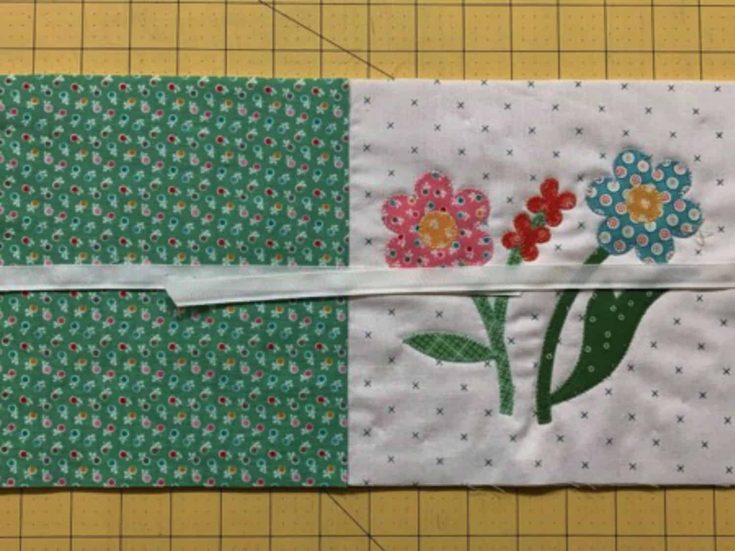 attaching ribbons to the appliqued seed keeper